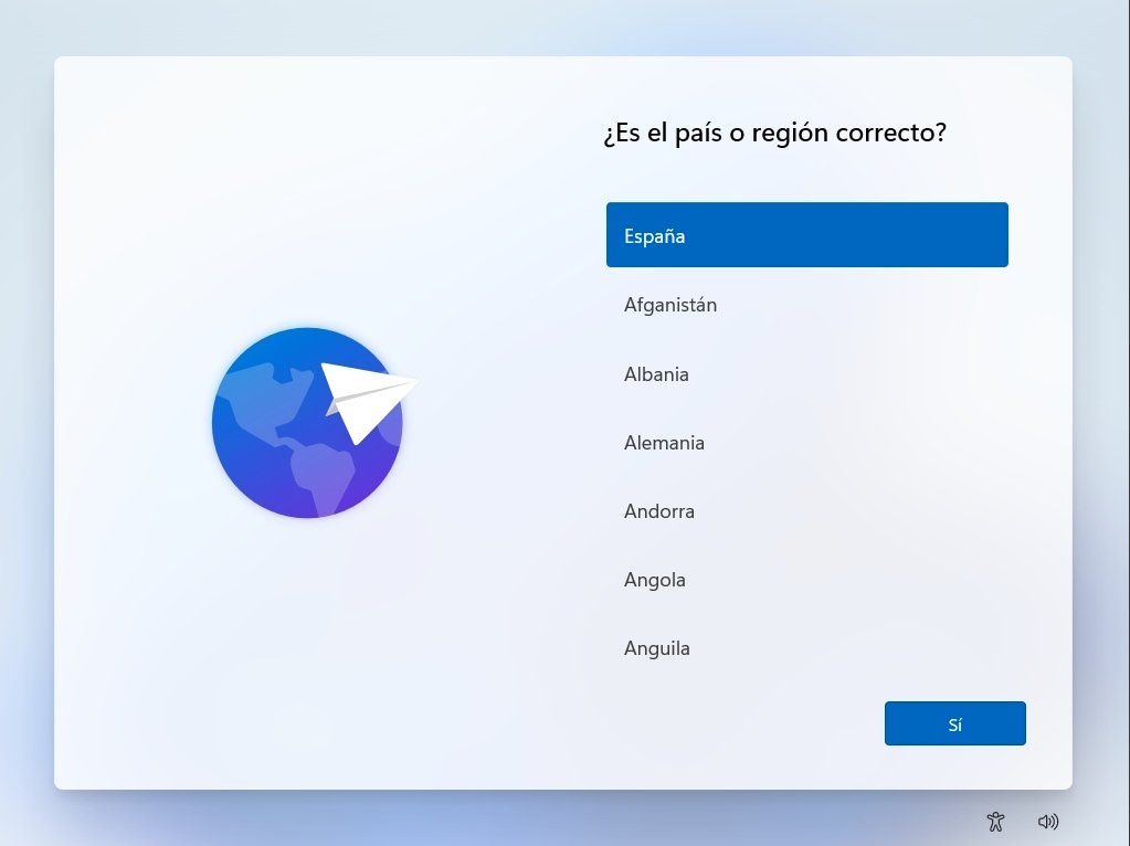 Pantalla de configuración inicial de Windows 11 preguntando por el país o región (España seleccionado) tras completar el restablecimiento de fábrica.