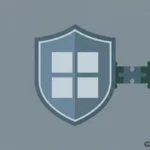 Escudo azul gris con ventana de cuatro cristales blancos, atravesado por piezas de puzle verde y blanco. Imagen generada con IA.