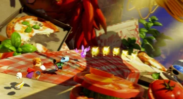 Personajes de Rayman Legends Retold corren sobre un mantel de cuadros entre una pizza, guindillas y rodajas de tomate gigantes