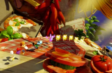 rayman-legends-retold-requisitos-pc Personajes de Rayman Legends Retold corren sobre un mantel de cuadros entre una pizza, guindillas y rodajas de tomate gigantes