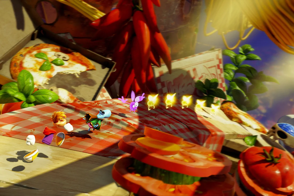 rayman-legends-retold-requisitos-pc Personajes de Rayman Legends Retold corren sobre un mantel de cuadros entre una pizza, guindillas y rodajas de tomate gigantes