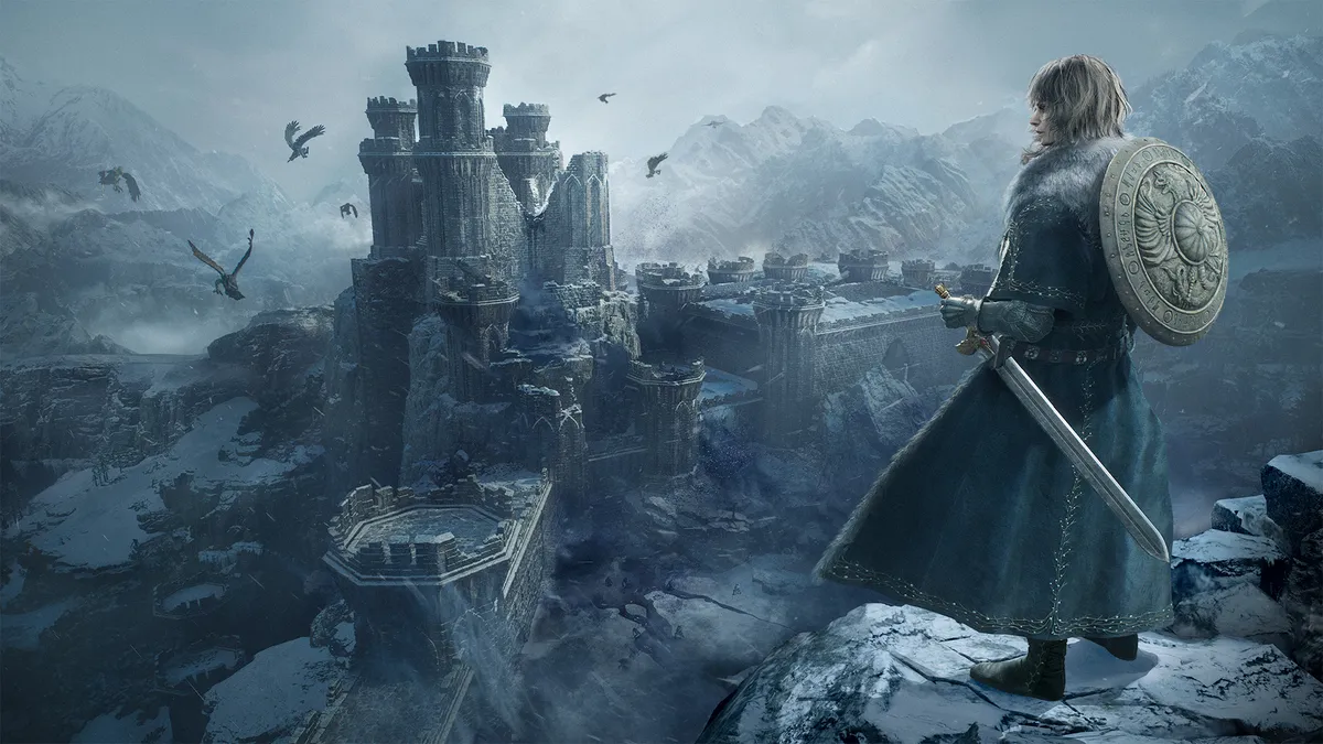 dragons-dogma-2-dark-arisen-norgan Imagen oficial de Dragon’s Dogma 2: Dark Arisen con un personaje de espaldas, con espada y escudo, ante una fortaleza en ruinas entre montañas nevadas